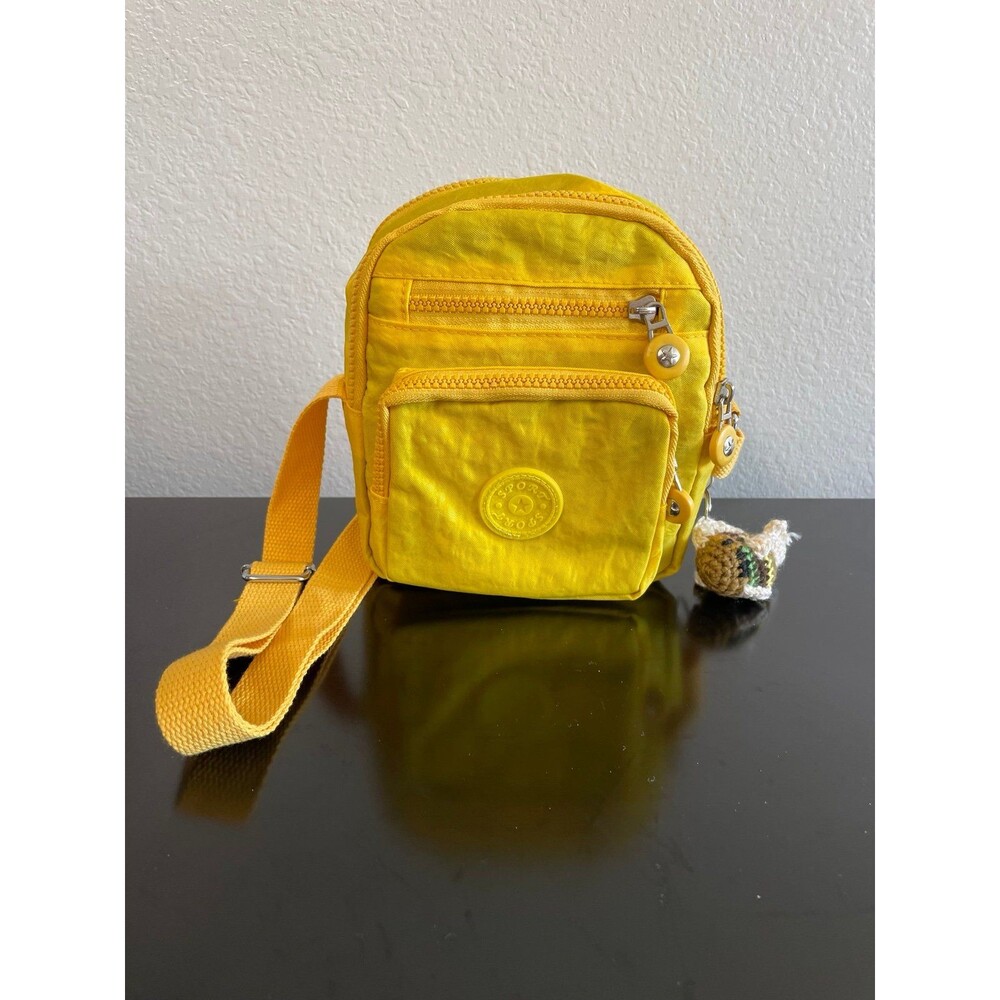 Yellow nylon crossbody bag with charm